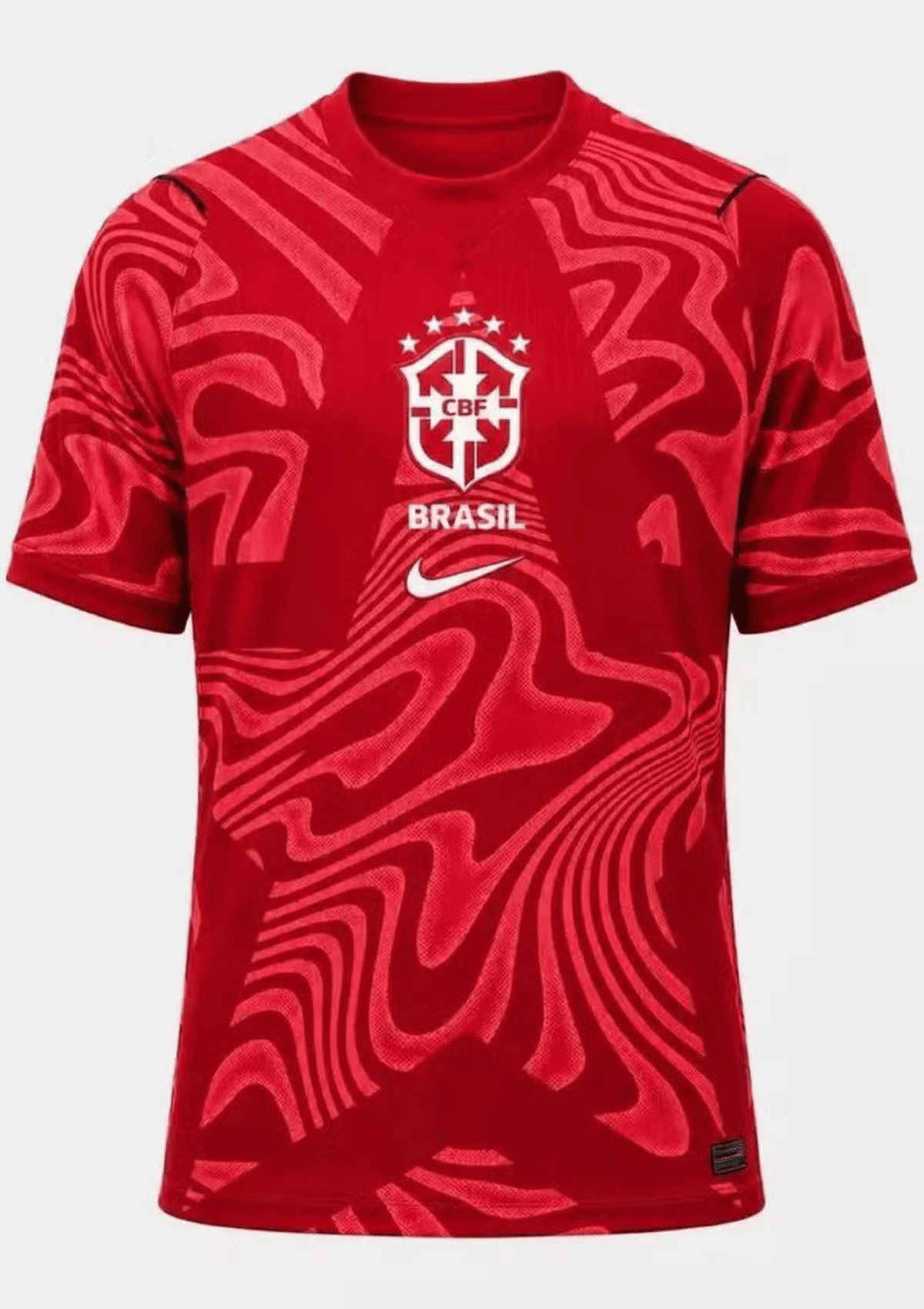 foto com cor. camisa vermelha goleiro seleção brasileira - metrópoles