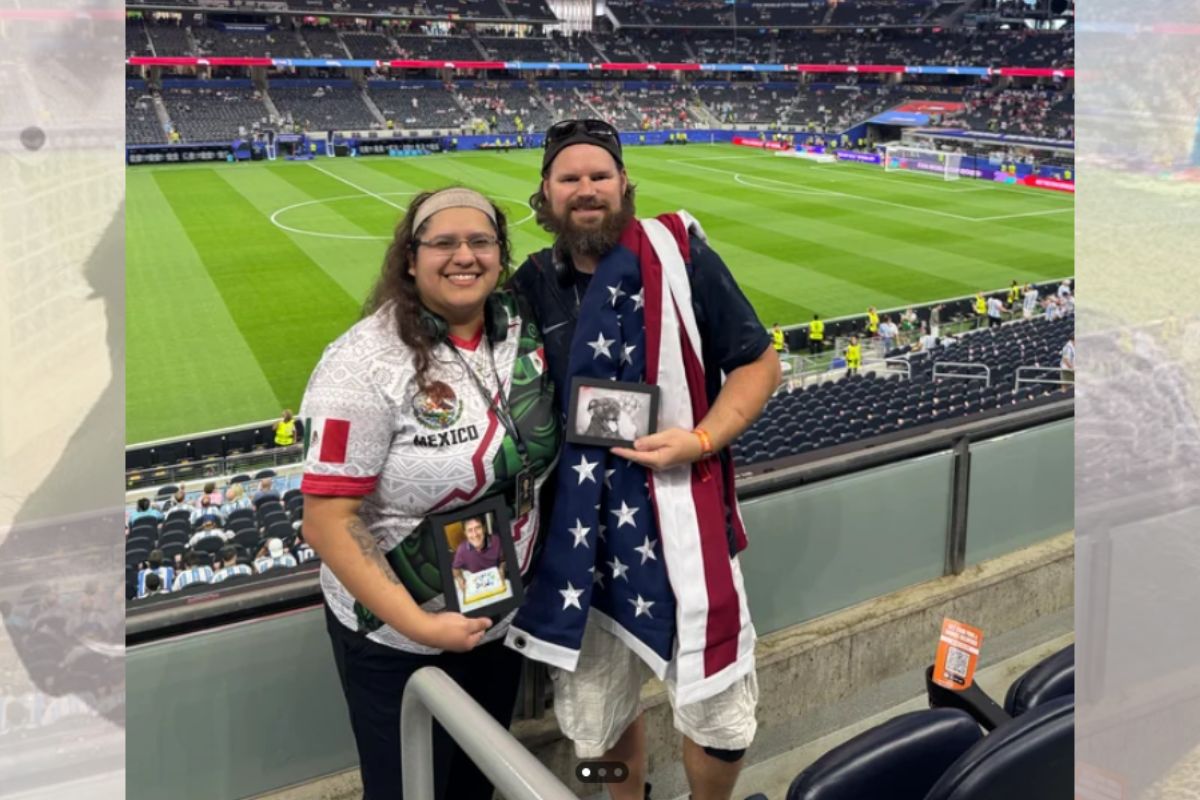 Mulher e marido em jogo de futebol