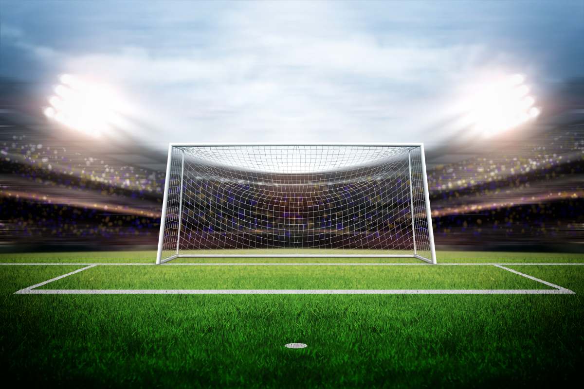 Gol em campo de futebol